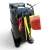 Top-angled view of a used Copeland RS64C2-CV .75 HP compressor (1 phase 208-230 volt), a black reciprocating compressor with multiple hang-tags including a red "660" inventory tag, a yellow "OIL SAFETY CONTROL" tag, and a red "CAUTION: UNDER PRESSURE" tag on the top service valve.