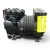 Front-right view of a used Copeland KAGA-010E-TAC 1 HP compressor (3 phase 208-230 volt), a semi-hermetic reciprocating compressor with finned cooling ribs, a Copelametic rating plate, and a red inventory tag "428" with a yellow "ADD OIL TO COMPRESSOR" tag hanging from the top valve.