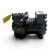 Another front three-quarter angle of the same used Copeland KALA-015E-TAC 1.5 HP compressor, 3 phase 208-230 volt, tilted slightly further to show the full bolted valve plate, terminal box knockouts, and mounting feet.