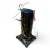 Front view of a used Copeland ZS19KAE-PFV 2.5 HP scroll compressor, 1 phase 208-230 volt, black cylindrical housing with red, blue, and yellow wire leads coiled around the base, a yellow paper tag, and a red round inventory tag numbered "730" at the top.