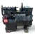 Similar opposite-side angle of the used Copeland ERFA-031E-TAD 3 HP compressor, 3 phase 460 volt, rotated further with the red "199" tag and a yellow oil tag both visible near the valve assembly.