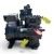 Front-right view of the used Copeland LACA-031A-TAC 3 HP compressor, 3 phase 208-230 volt, with the red "96" tag and a second black compressor unit visible blurred in the background.