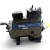Front view of the used Copeland 2DL3-F20KL-TFC 4 HP Discus compressor (3 phase, 208-230 volt), showing the "Copeland Discus" nameplate with model number, an oil-safety-control checklist tag hanging on the right, and the black cast crankcase and mounting feet.