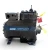 Straight-on front view of a used Copeland 3DJHA-075L-TFD 7.5 HP compressor, 3 phase 460 volt, with a gray-black housing, blue Copeland Discus nameplate, and a yellow tag hanging from an upper mounting bolt.