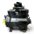Front-right angled view of the used Copeland 2DA3-F23KE-TFC 6 HP compressor, 3 phase 208-230 volt, with a second tagged compressor visible blurred in the background.