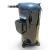 Front-left angled view of a used Copeland ZB50KCE-TF5 6.5 HP compressor, 3 phase 208-230 volt, showing a worn brass-toned black cylindrical body with a red round tag numbered "390" at the top, a black terminal box on the left side, and the cast mounting base with bolted feet below.