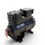 Three-quarter front-left view of the used Copeland 2DA3-R89KE-TFC 7.5 HP compressor, 3 phase 208-230 volt, showing a red inventory tag hanging near the crankcase and the mounting feet visible at the base.