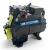 Straight-on front view of a weathered used Copeland 2DL3-075E-TFD 7.5 HP compressor, 3 phase 460 volt, with a worn silver Copelametic nameplate and a red round inventory tag plus a multi-line yellow inspection tag hanging together.