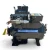 Three-quarter front-left view of the used Copeland 3DB3-F33KE-TFC 7.5 HP compressor, 3 phase 208-230 volt, showing a black housing, a red inventory tag and yellow oil tag hanging near the base, and a foil-wrapped copper line at the top left.