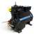 Straight-on front view of the used Copeland 3DJH-F33KE-TFD 7.5 HP compressor, 3 phase 460 volt, with a black housing, blue Copeland Discus nameplate, a foil-wrapped copper suction line at the left, and yellow "add oil to compressor" tags hanging near the base.