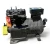 Three-quarter front-right view of the used Copeland 9RB1-076A-TFD 7.5 HP compressor, 3 phase 460 volt, with a gray-black finned housing, silver Copelametic nameplate, and a red round inventory tag with a yellow inspection tag attached.