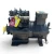 Three-quarter front-right view (rotated) of the used Copeland 9RS3-076A-TFD 7.5 HP compressor, 3 phase 460 volt, with the black finned housing, a red inventory tag hanging near the top valve, and a foil-wrapped copper line visible near the bottom right.