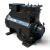 Three-quarter rear view of the used Copeland 3DB3-F33KE-TFD 7.5 HP Copelametic compressor, 3 phase 460 volt, showing the cylindrical crankcase, the blue Copeland Discus nameplate, and the drive shaft end with mounting bolts.