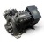 Side view of the used Copeland 4DA3-F47KE-TSK 10 HP compressor, 3 phase dual voltage, showing the bolted valve covers, terminal box, and mounting feet of the open-drive reciprocating body.