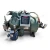 Close three-quarter view of the used Carlyle 06DM3376DC367 10 HP compressor (3 phase 460 volt), aqua-green housing with a white "LP Compressor #1" oil safety control box mounted at front left, a blue round oil separator tank with valve fittings at the base, and a model number stamped into the shell.