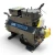 Closer front-right three-quarter view of the used Copeland 3DF3-R15ML-TFC 12 HP compressor, showing a white paper service tag hanging from the top cap and the yellow "Add Oil to Compressor" tag draped over the end bell valve.