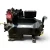 Front-right three-quarter view of the used Copeland 3DK3-R15ME-TFC 12 HP compressor, showing the same green copper line and "Copeland Discus" nameplate from a slightly higher angle, with a yellow tag reading "Compressor" visible at the base.