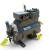 Front-left three-quarter view of the used Copeland 3DK3A-120E-TFC 12 HP compressor, showing the same blue-capped copper stub and "Copeland Discus" nameplate along with multiple yellow "Add Oil to Compressor" tags hanging from the terminal box, foot, and end bell.