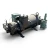 Straight-on front view of the used Copeland SHL1-2000-TWK 20 HP compressor, 3 phase Dual Voltage, showing the black motor housing, hex-bolted valve cap on top, and the green light-colored oil valve block on the right.