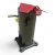 Side view of the used Copeland ZS38K4E-TF5 5 HP compressor, 3 phase 208-230 volt, showing the plain black cylindrical body with the red round tag "46" and a red paper tag at the top, a short copper stub pipe bent to the left, and a yellow tag partly visible near the base.