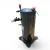 Front-left view of a used Copeland ZF15K4E-TF5 5.5 HP scroll compressor, 3 phase 208-230 volt, showing a red oval "455" inventory tag, a red cylindrical run capacitor on top, and a valve fitting wrapped in foil tape.