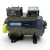 Front-left angled view of the used Copeland 2DA3-F23KE-TFC 6 HP compressor, 3 phase 208-230 volt, showing a clearly legible red oval "768" tag and a taped copper hairpin discharge line.