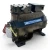 Front-left angled view of the used Copeland 3DA3-F28KE-TFC 6 HP compressor showing the oil sight glass, mounting foot, and hanging inspection tags against a white background.