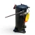 Front-left angled view of a used Copeland ZF18K4E-TF5 6 HP compressor, 3 phase 208-230 volt, showing an orange and yellow flag tag hanging from the pressure valve assembly on the front, a partial blue Copeland rating label, and the cast mounting base with bolted feet.