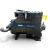 Front-left three-quarter view of the used Copeland 3DS3-R17ME-TFC 15 HP compressor, showing the red "333" tag, a white service checklist tag, a yellow "Add Oil to Compressor" tag, and the same foil-tipped tube crossing the top.