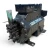 Front-right three-quarter view of the used Copeland 3DS3A-150L-TFC 15 HP compressor, showing the same green foil-tipped copper line from a mirrored angle and the full nameplate with model and rating table.