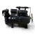Front view of the used Copeland 6DL3-F93KE-TSK 27 HP compressor, 3 phase Dual Voltage, black finish, showing the finned oil cooler on top, a black Danger/Copeland Quality terminal box, and a yellow "Add Oil to Compressor" tag on the right valve.