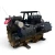 Angled front-right view of the used Copeland 6DL3-F93KE-TSK 27 HP compressor, 3 phase Dual Voltage, showing the crankcase heater assembly, a foil-capped service valve with a ball valve fitting, and a red inventory tag on the far right.