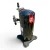 Front-left 3/4 view of the used Copeland ZS21K4E-TFD 3 HP scroll compressor (3 phase, 460 volt), showing a red-handled brass ball valve and a foil-wrapped access valve at the top of the black dome, a partially visible nameplate, and a small red round inventory tag hanging near the crown.