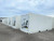 White portable refrigeration container with equipment within view