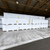 Stacked pallets of insulated cold storage panels wrapped in plastic