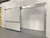 Off-white manual sliding cooler-freezer door