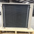 Back view of beige condensing unit on pallet