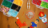 12kjvf535l1s52vgq6j4ptv95a-13441_Bertie_Fuse_Bead_Tub_Bright_Black_3000pc_Lifestyle_1.jpg