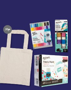 Calico shopping bag decorating kit – a natural canvas tote bag alongside Mont Marte fabric markers and fabric paint sets on a green background
