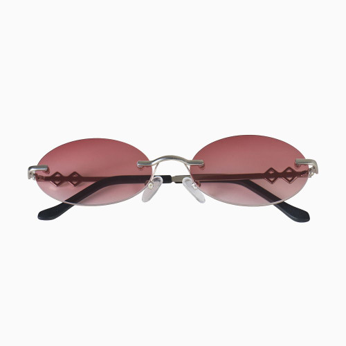 Front view | Oval sunglasses with red lenses and silver frames | Metal | Vicky | Women's sunglasses | Karen Wazen Eyewear