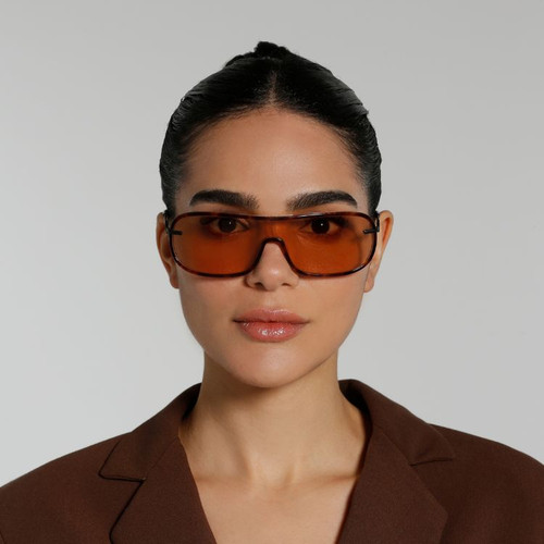 Front view of model wearing sunglasses | Mask sunglasses with brown lenses and tortoise frames | Acetate & Metal | Jordan | Women's sunglasses | Karen Wazen Eyewear