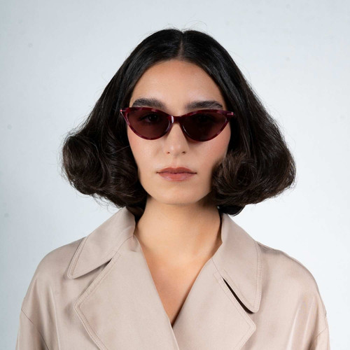 Front view of model wearing sunglasses | Cat-like sunglasses with pink lenses and pink tortoise frames | Metal & Acetate | Kourt | Women's sunglasses | Karen Wazen Eyewear