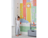 wooden growth chart in bedroom