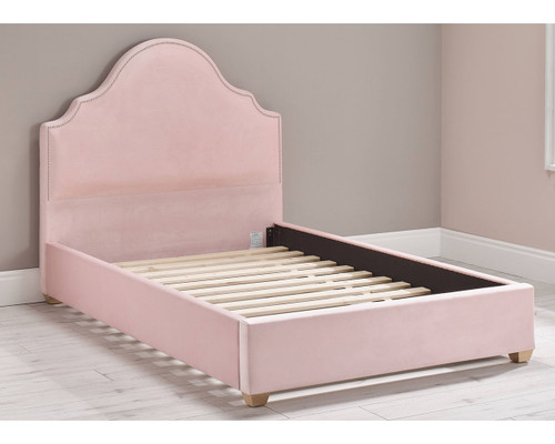 pink upholstered double bed - no mattress shown