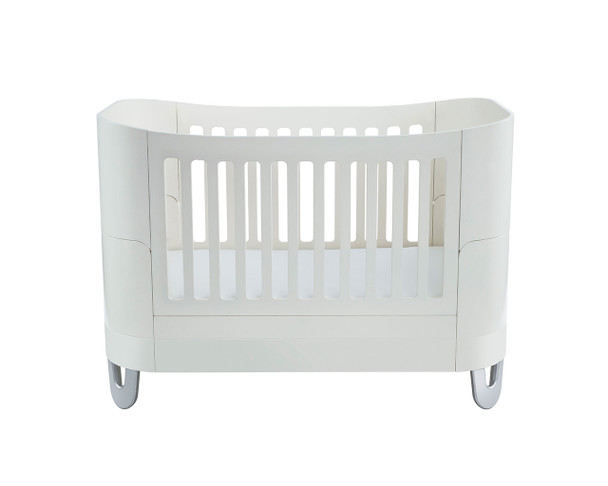 Cot bed in white with low mattress position