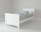 white single bed without decoration