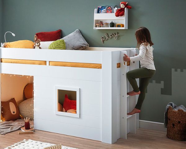 Fort midsleeper bed with a girl climbing the ladder