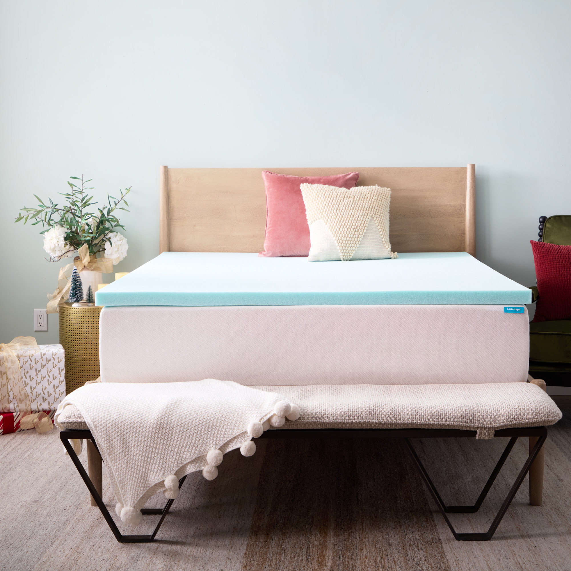 Woman and dog sleeping in bed.