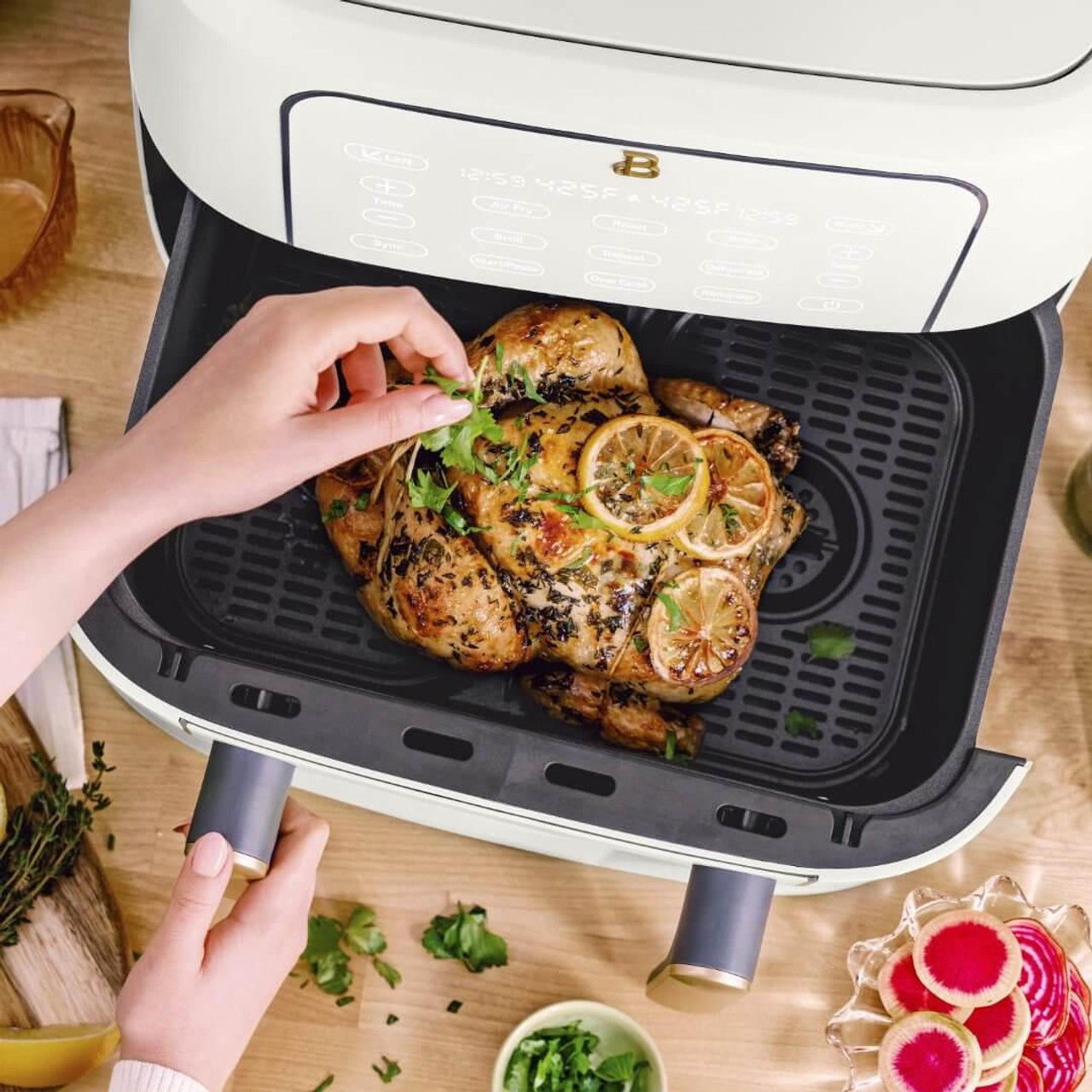 https://cdn11.bigcommerce.com/s-g5ygv2at8j/images/stencil/1280x1280/products/14017/29834/beautiful-9qt-trizone-air-fryer-by-drew-barrymore__02163.1688348709.jpg?c=1
