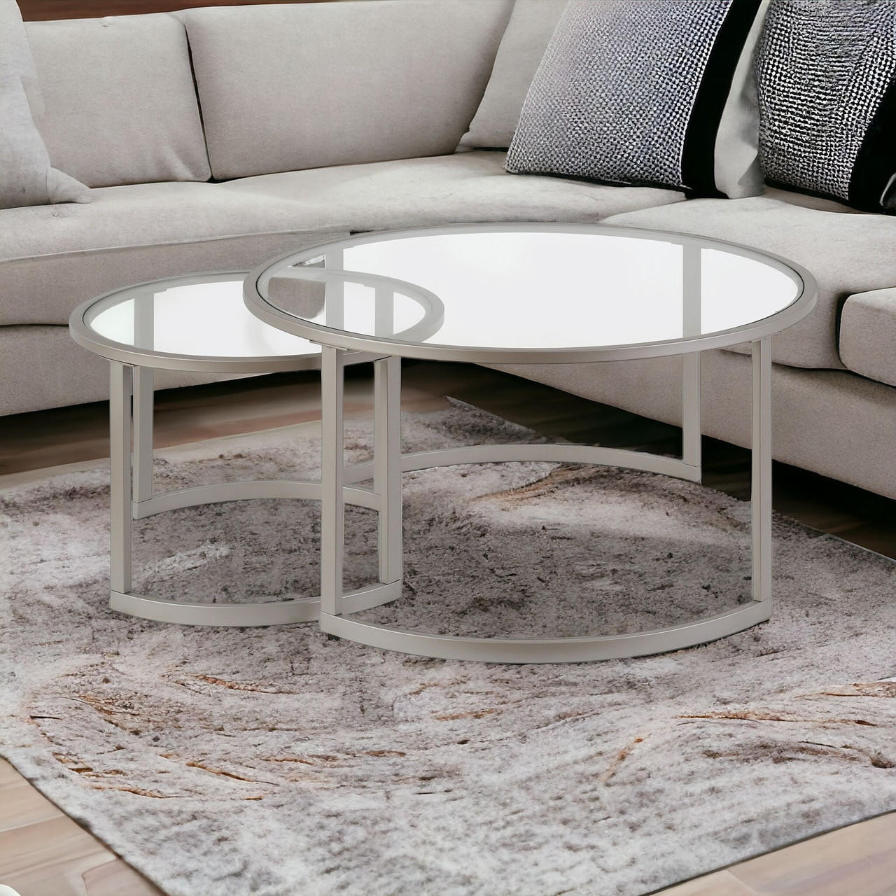 homeroots living room Set Of Two 36" Nickel and Glass Round Nested Coffee Tables 